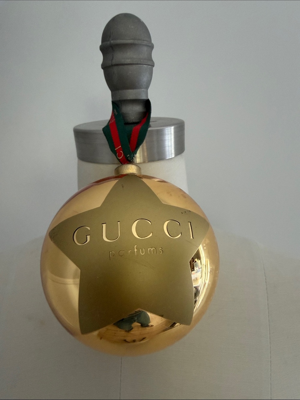 Gucci Gold Star Ornament with Green and Red Ribbon
